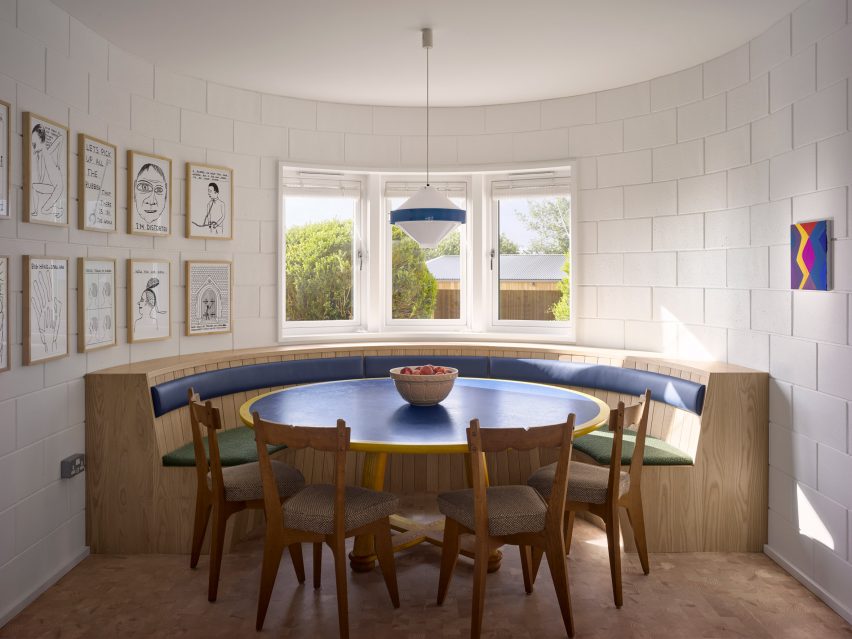 White-walled kitchen with curved seating