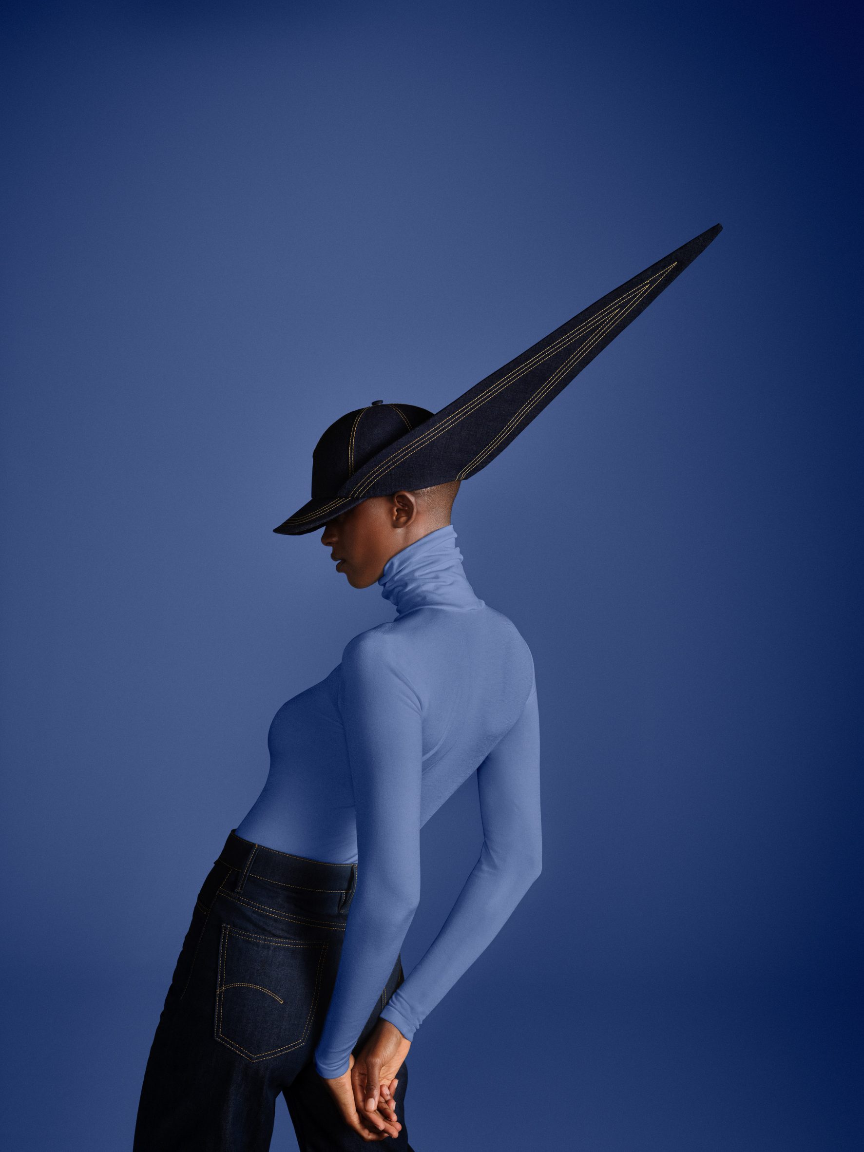 Image of a person wearing a denim hat