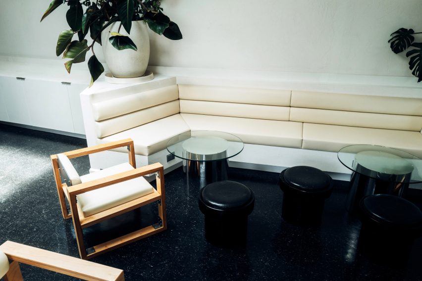 Seating area with cream leather banquette