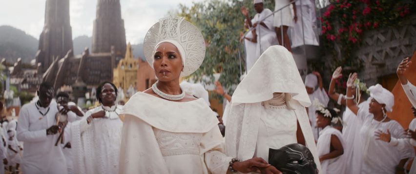 Two characters in Wakanda Forever wearing white costumes