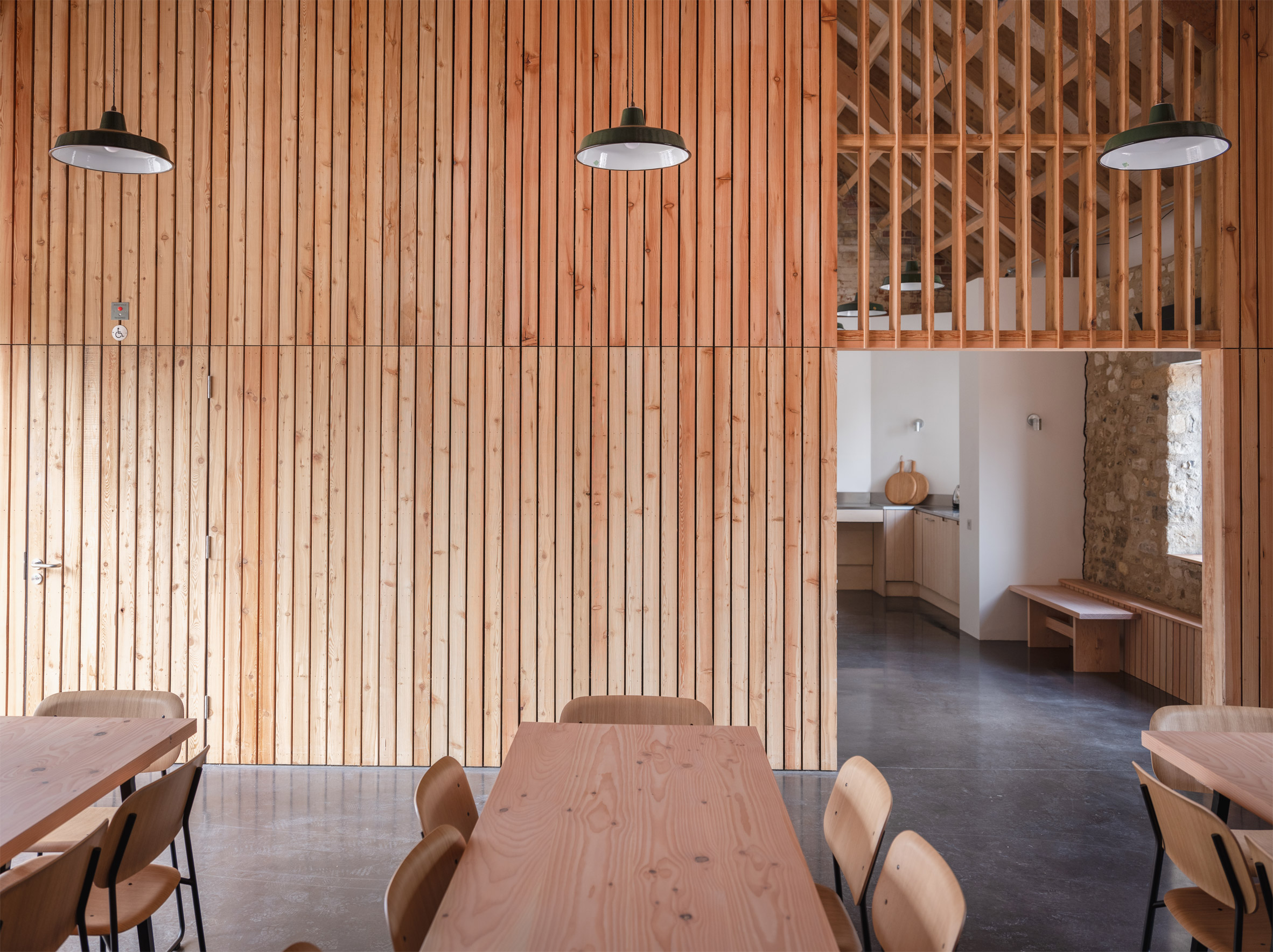 Wood-lined community space by Clementine Blakemore Architects