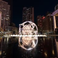 A glowing rounded installation by Es Devlin