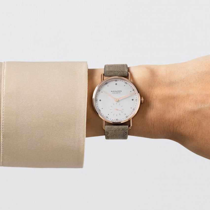 Nomos watch with gold dial