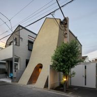 Sweeping facade animates manga artist's house in Tokyo by Tan Yamanouchi & AWGL