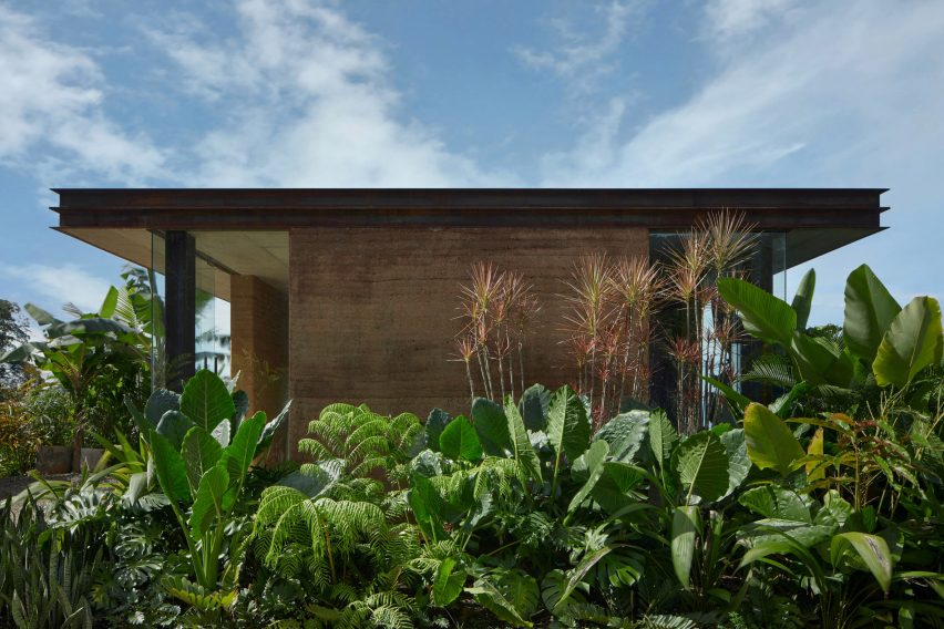 Rammed earth siding on villa in Costa Rican jungle