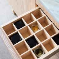 Photograph of drawer containing compartments with jars
