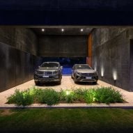 Lower ground parking space at the Black House by AR Arquitectos
