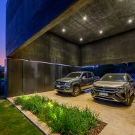 Lower ground parking space at the Black House by AR Arquitectos
