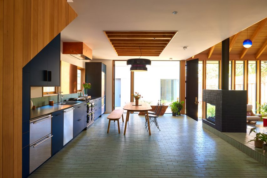 Kitchen with turquoise floor tiles