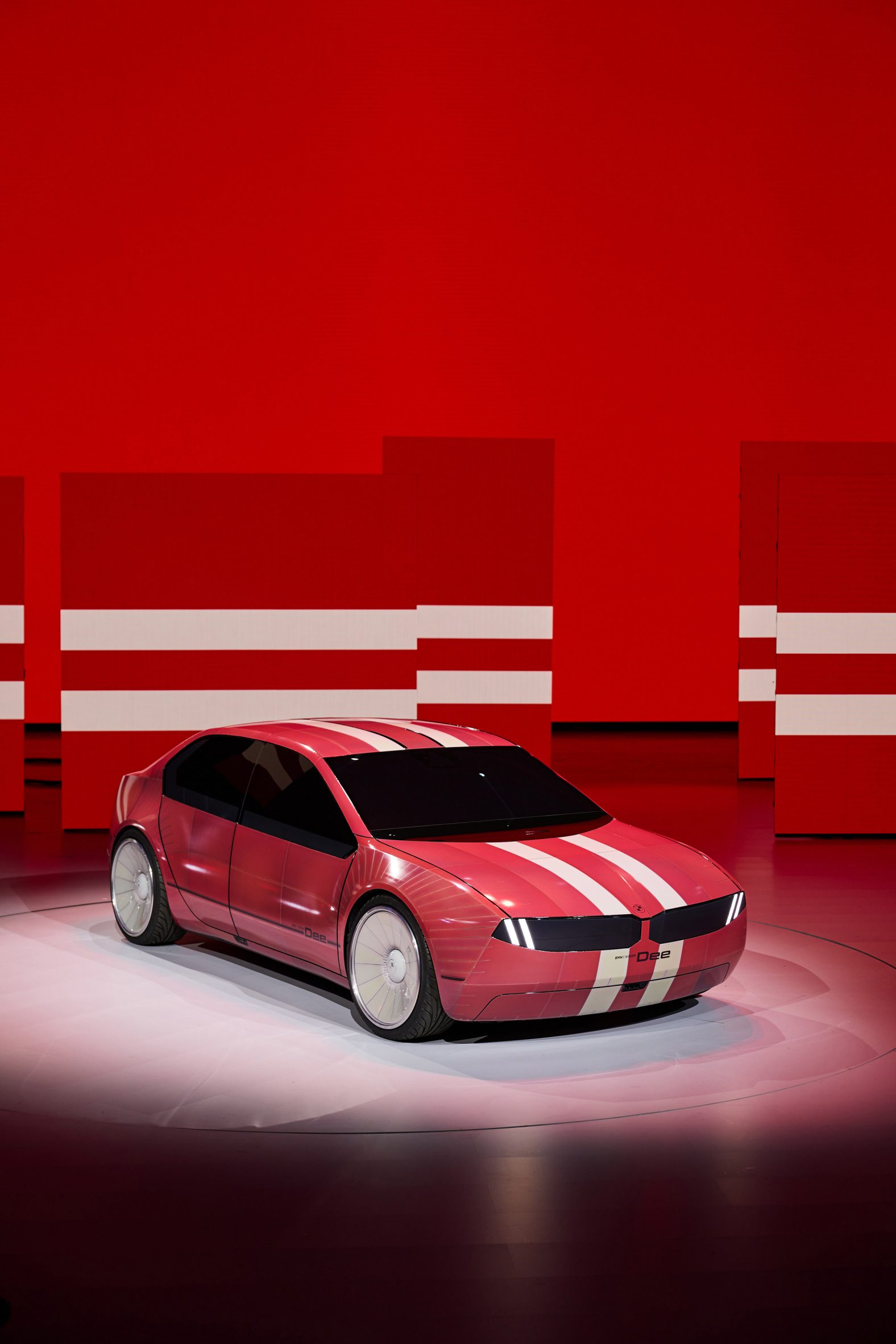 Red colour chaning car with white stripes