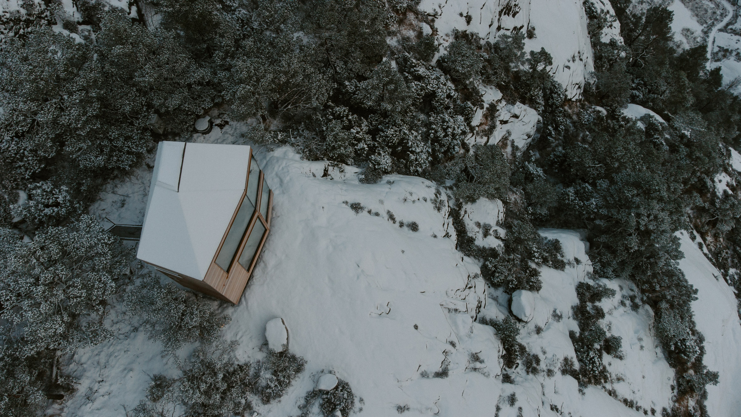 Aerial view of wooden cabin by Snøhetta