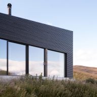 Brown & Brown completes black timber-clad home in the Scottish Highlands