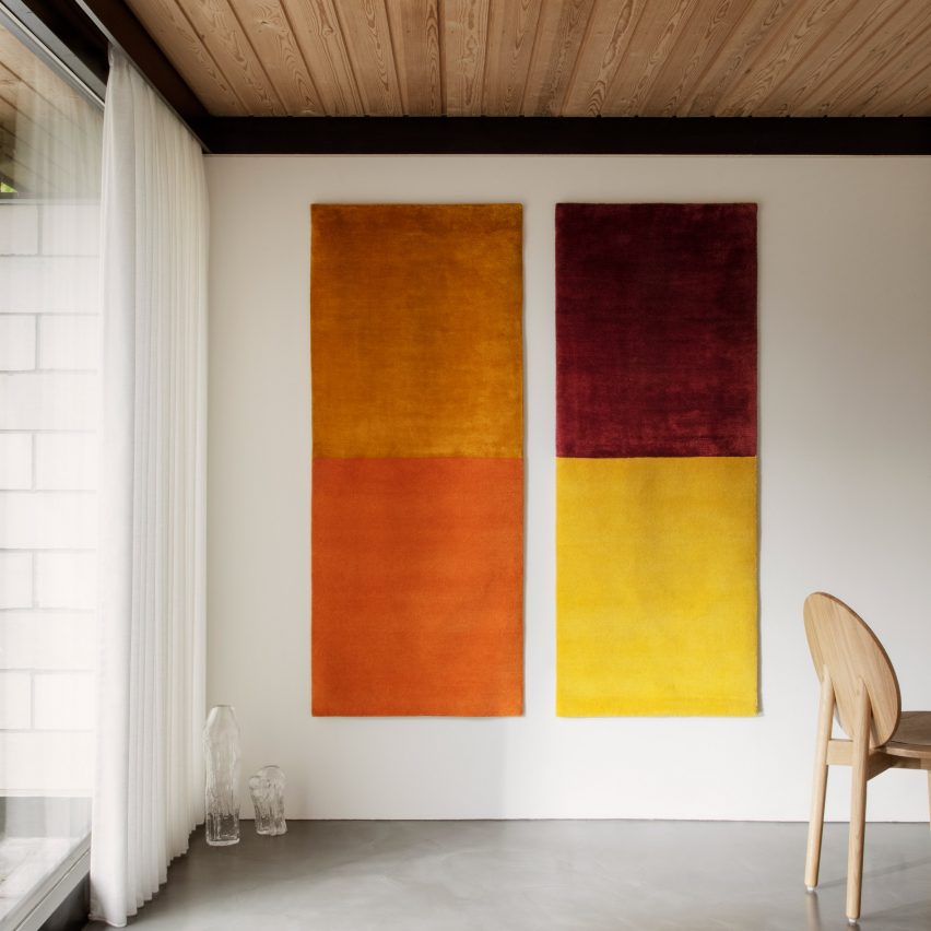 Two dual-colour tapestries on a wall