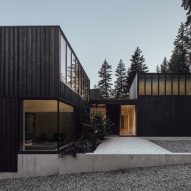 Leckie Studio creates timber-clad house to frame views of Canadian Rockies
