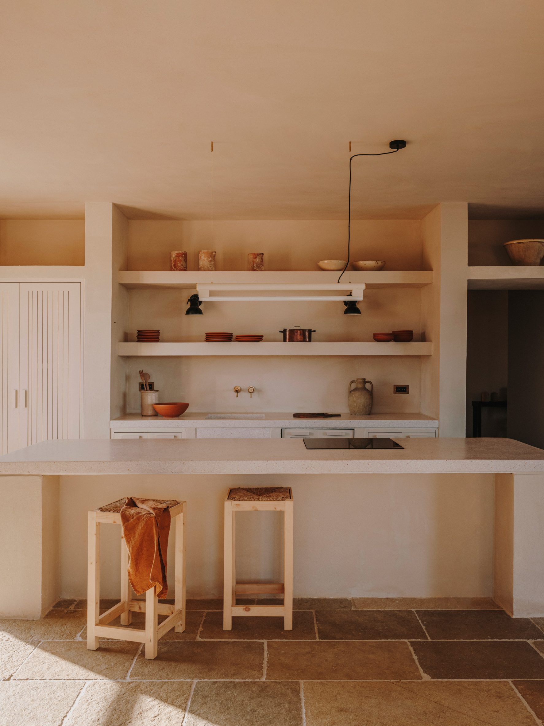 Earth-toned kitchen in villa in Puglia