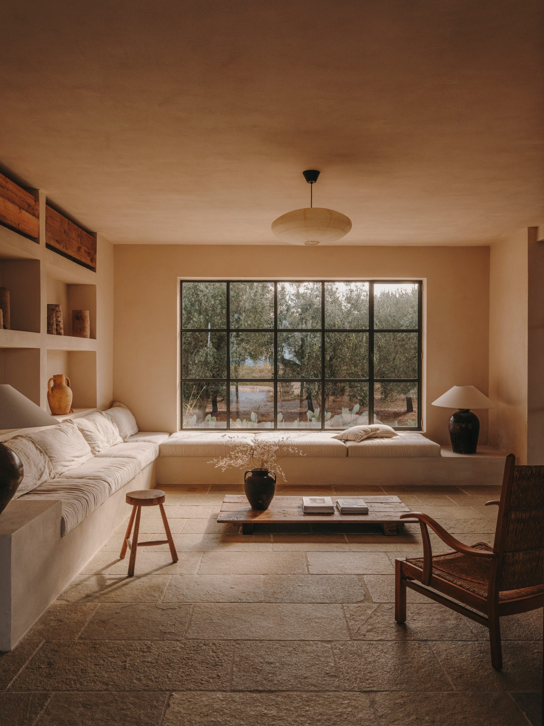 Earth-toned living room of Casa Maiora by Studio Andrew Trotter