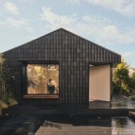 Hyper converts suburban garage into Dark Matter garden studio