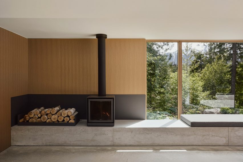 Wood and concrete-lined interiors of remote Canadian cottage
