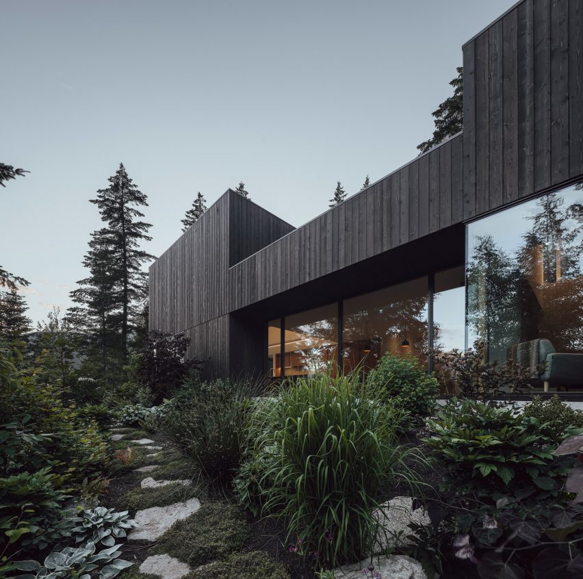 Rectilinear black house with views of the Canadian Rockies