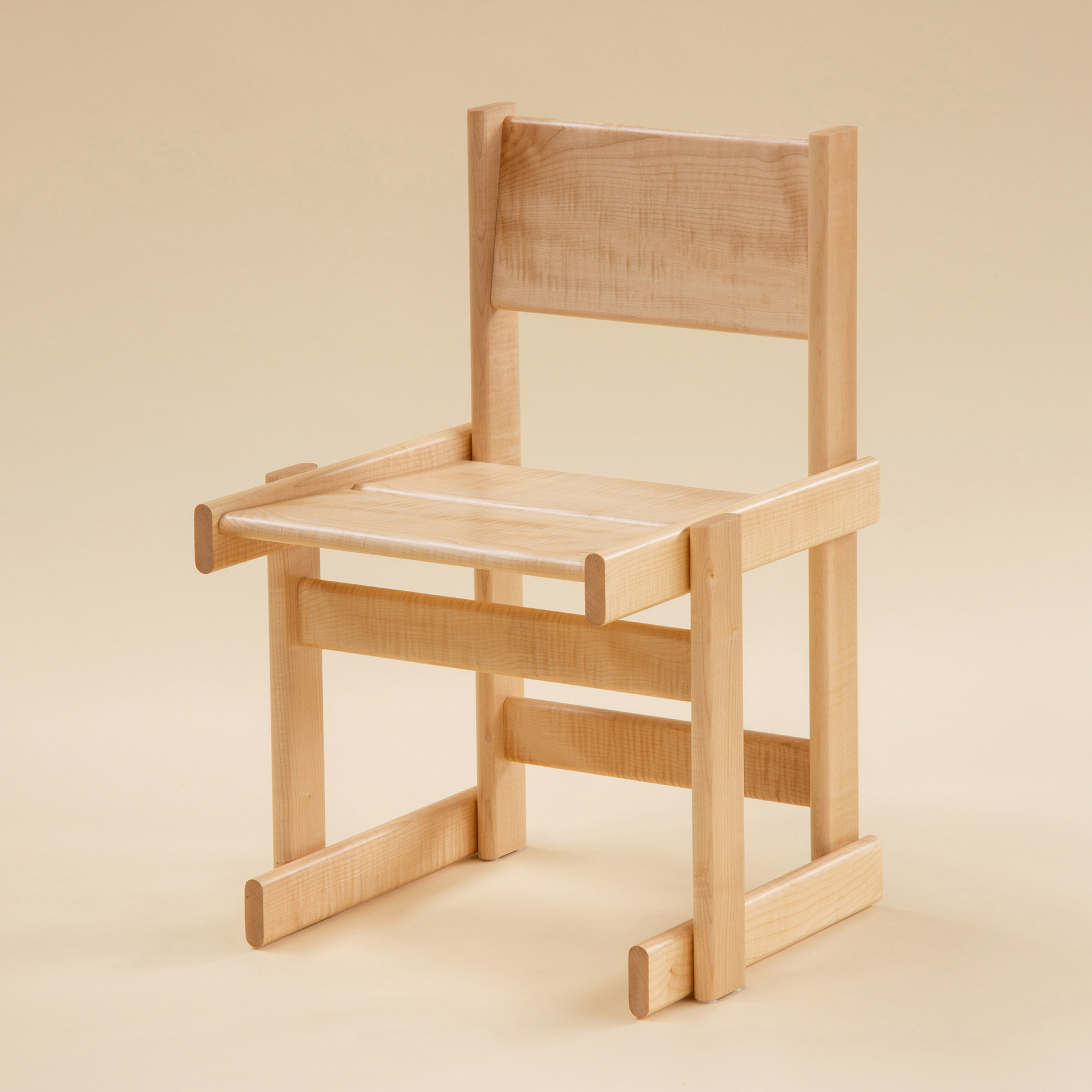 Wooden Bullnose chair by 2022 Ralph Saltzman Prize-winner