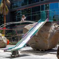 Mike Hewson installs giant boulders on wheels for "risk play" space in Melbourne