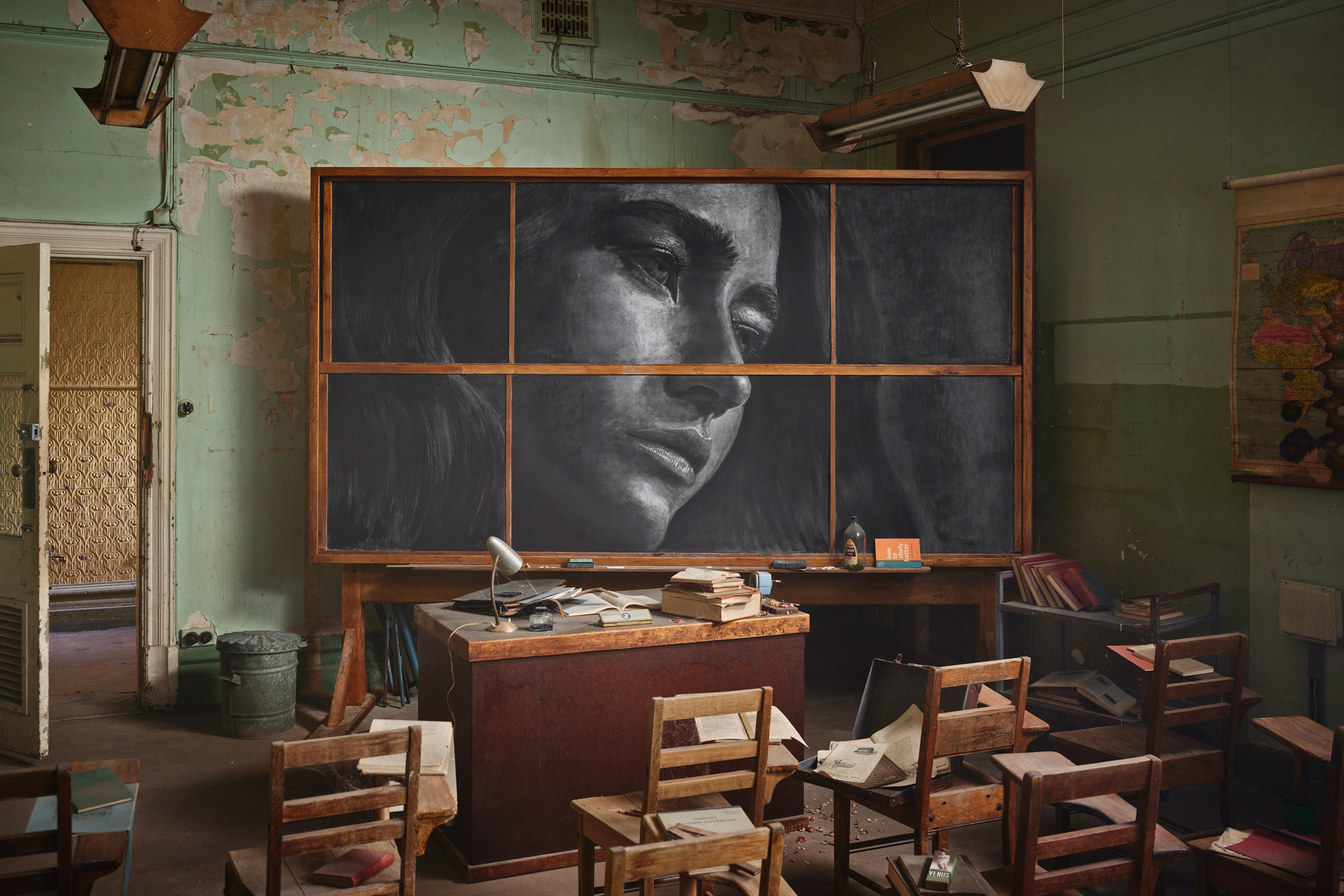 Interior space with wooden furniture at the Time exhibition by Rone