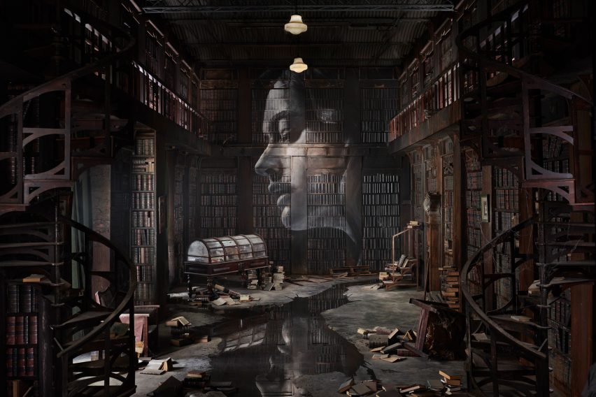 Dimly lit library at the Time exhibition by Rone