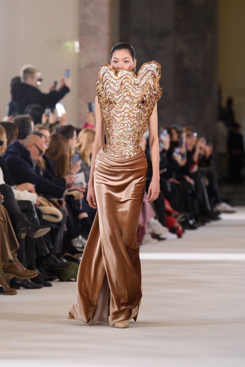 Photo of a rose gold dress at the couture show