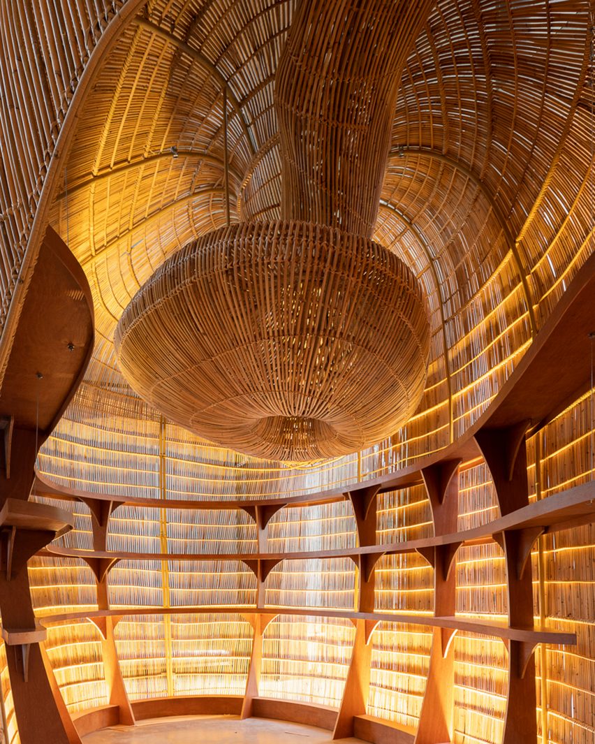 Inside of a rattan pod with built-in shelving