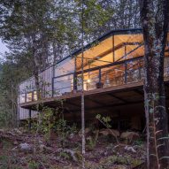 Hebra Arquitectos lifts Quilanto House above forested site in Chile