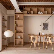 Interior shelving and dining space in Kyiv apartment by Yana Molodykh