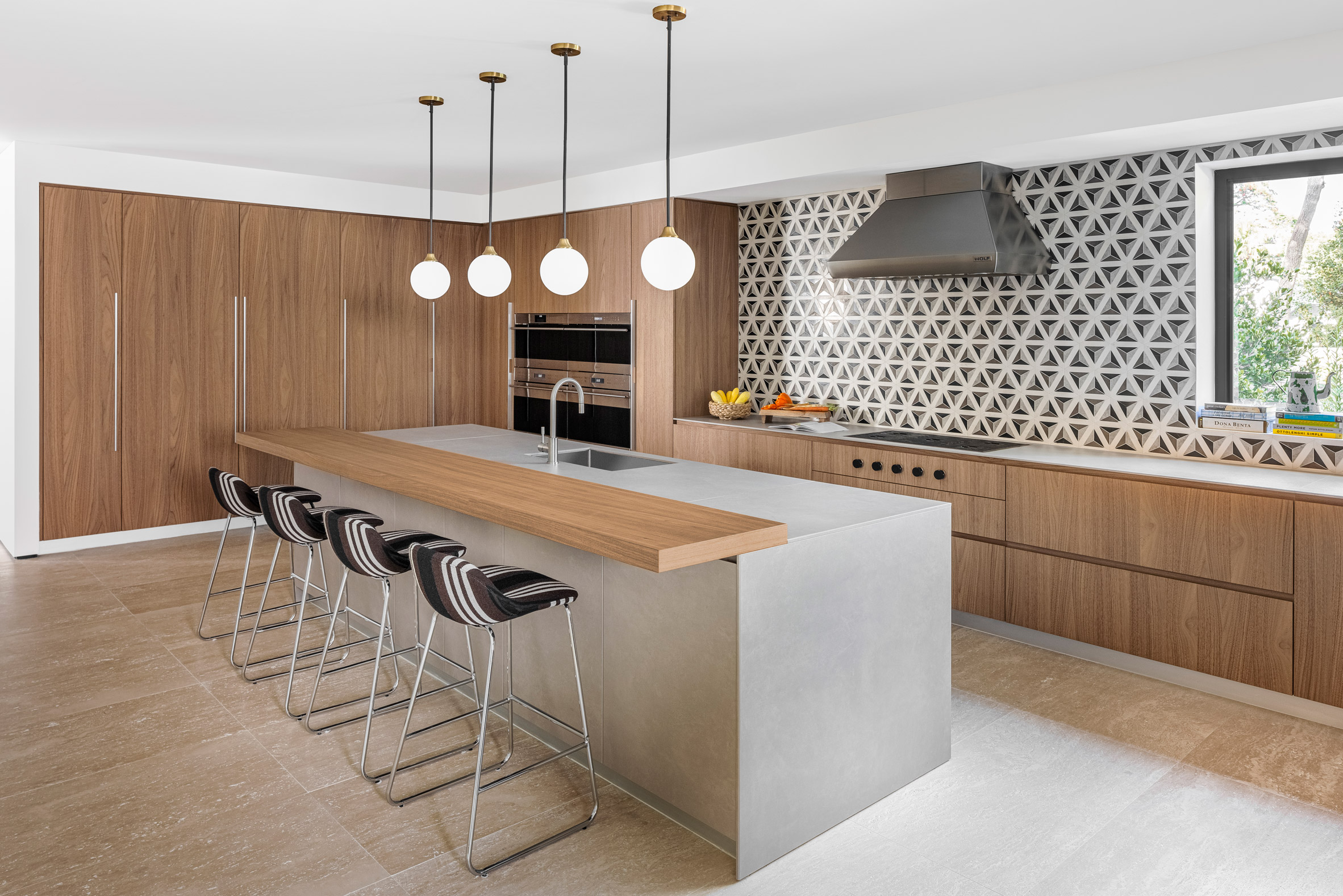 Neutral colours within kitchen in Miami mansion by Strang Design