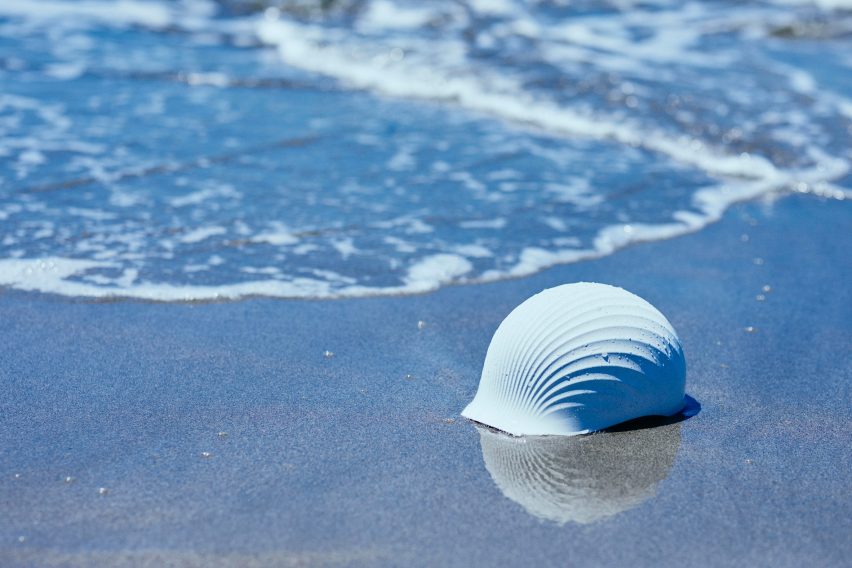 Shell-based hardhat-style helmet on the beach