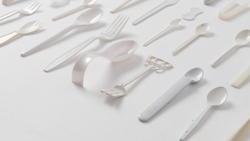 Picture of white plastic spoons on a white backdrop used to illustrate story about UK's ban on single-use plastic tableware
