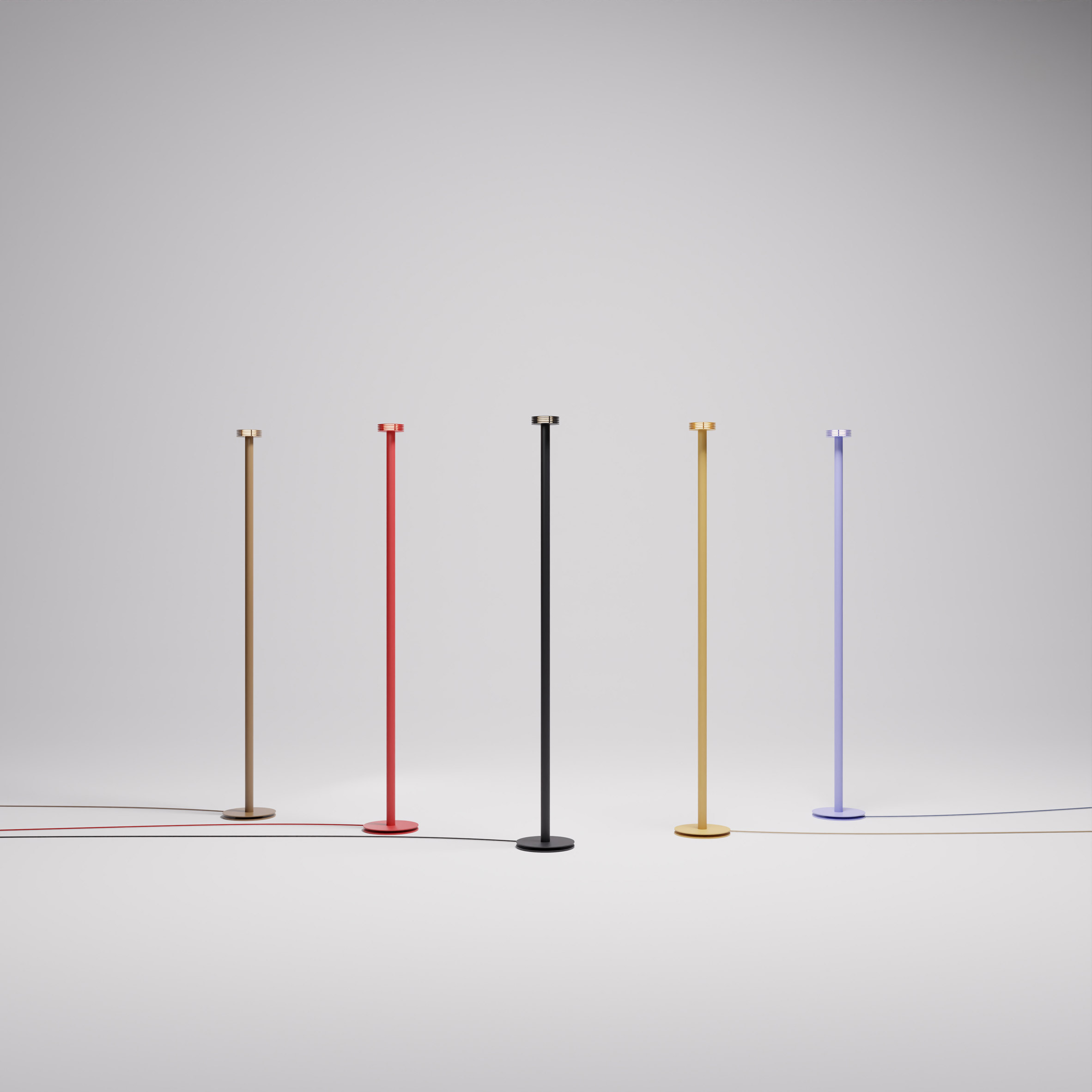 Multi-coloured floor lamps on grey backdrop