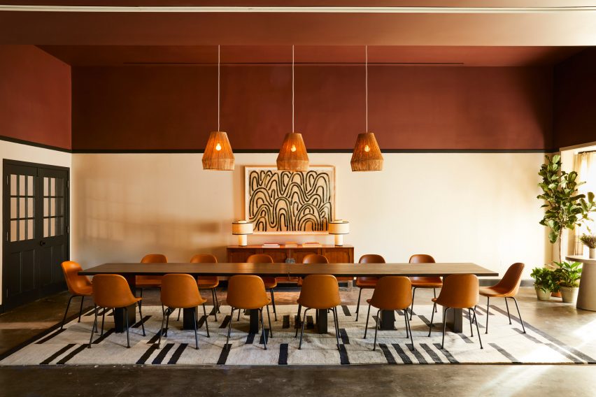 Conference room with long table and sienna brown ceiling