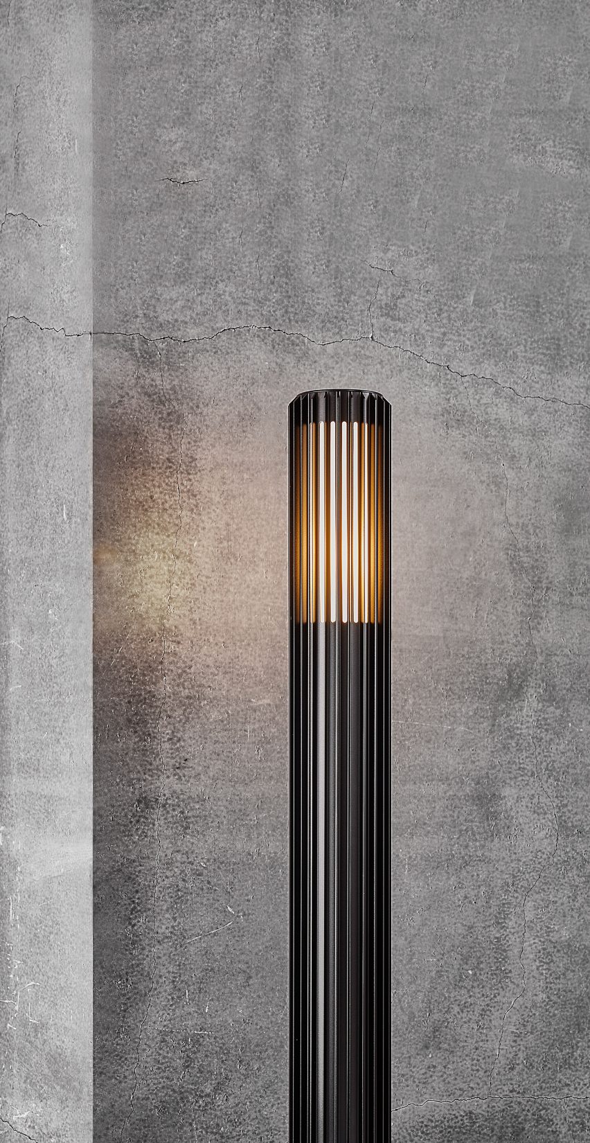 Black ribbed cylindrical garden light by Nordlux
