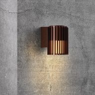 Brown metallic wall light by Nordlux