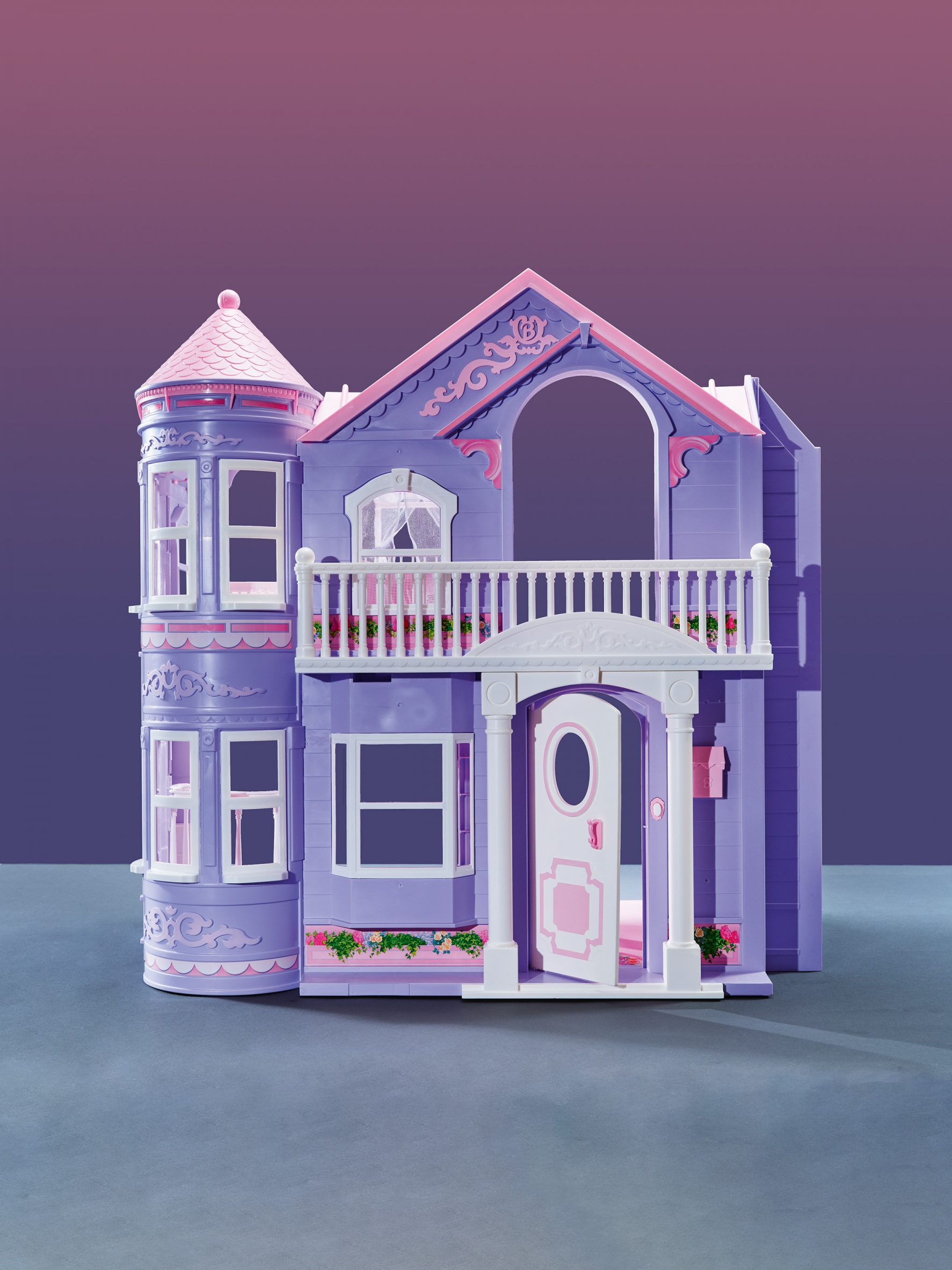 Purple castle-looking dollhouse from 2000
