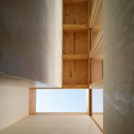Circulation space with skylight and timber ceiling