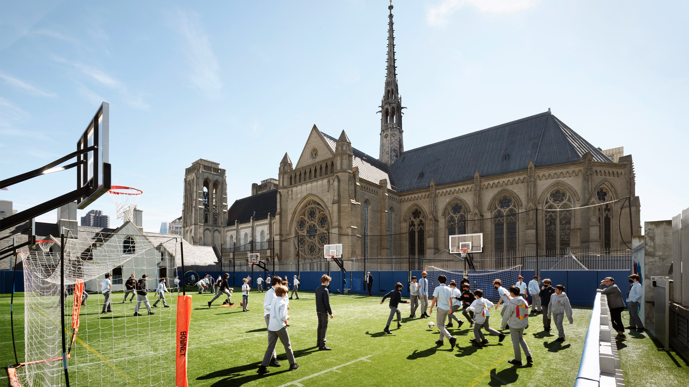 Charles F Bloszies inserts glass addition to cathedral complex