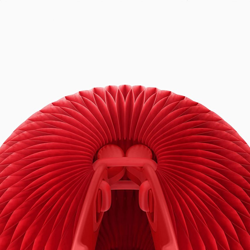 Рендеринг детали дизайна носа Джони Айва Red Nose Day, показывающий резиновое крепление в том месте, где мяч прикрепляется к носу.