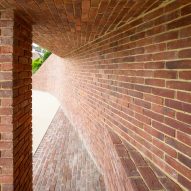 Curved brick wall with brick seating