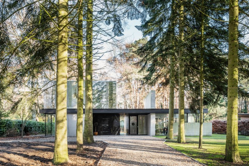 Two-storey home in a forest by Studio Okami Architecten