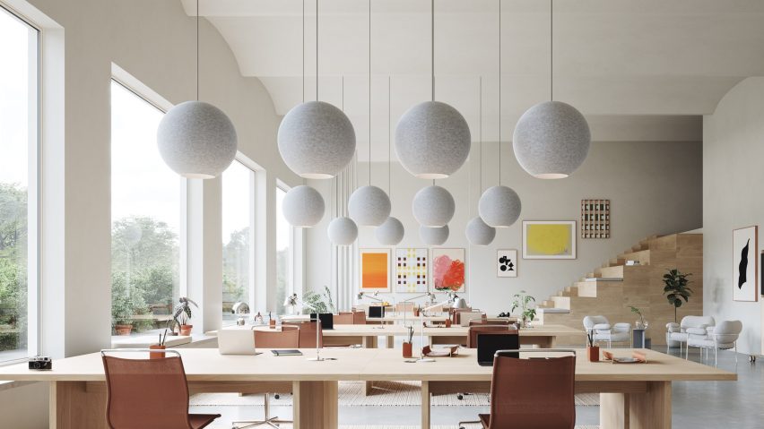 Office space with circular pendant lights