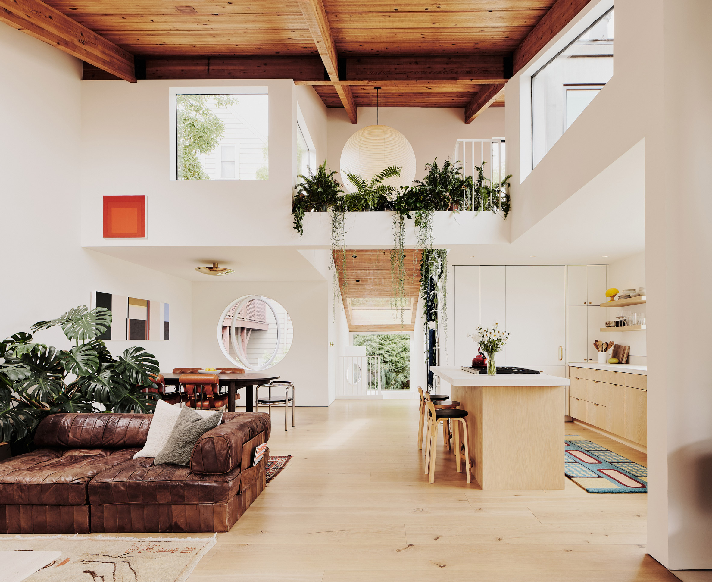 Wood-toned interior within Hosono House with skylights