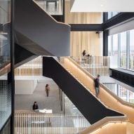 Black staircases link SC Workplace by Behnisch Architekten