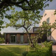 Johan Sundberg Arkitektur adds larch-clad extension to villa in Swedish apple orchard
