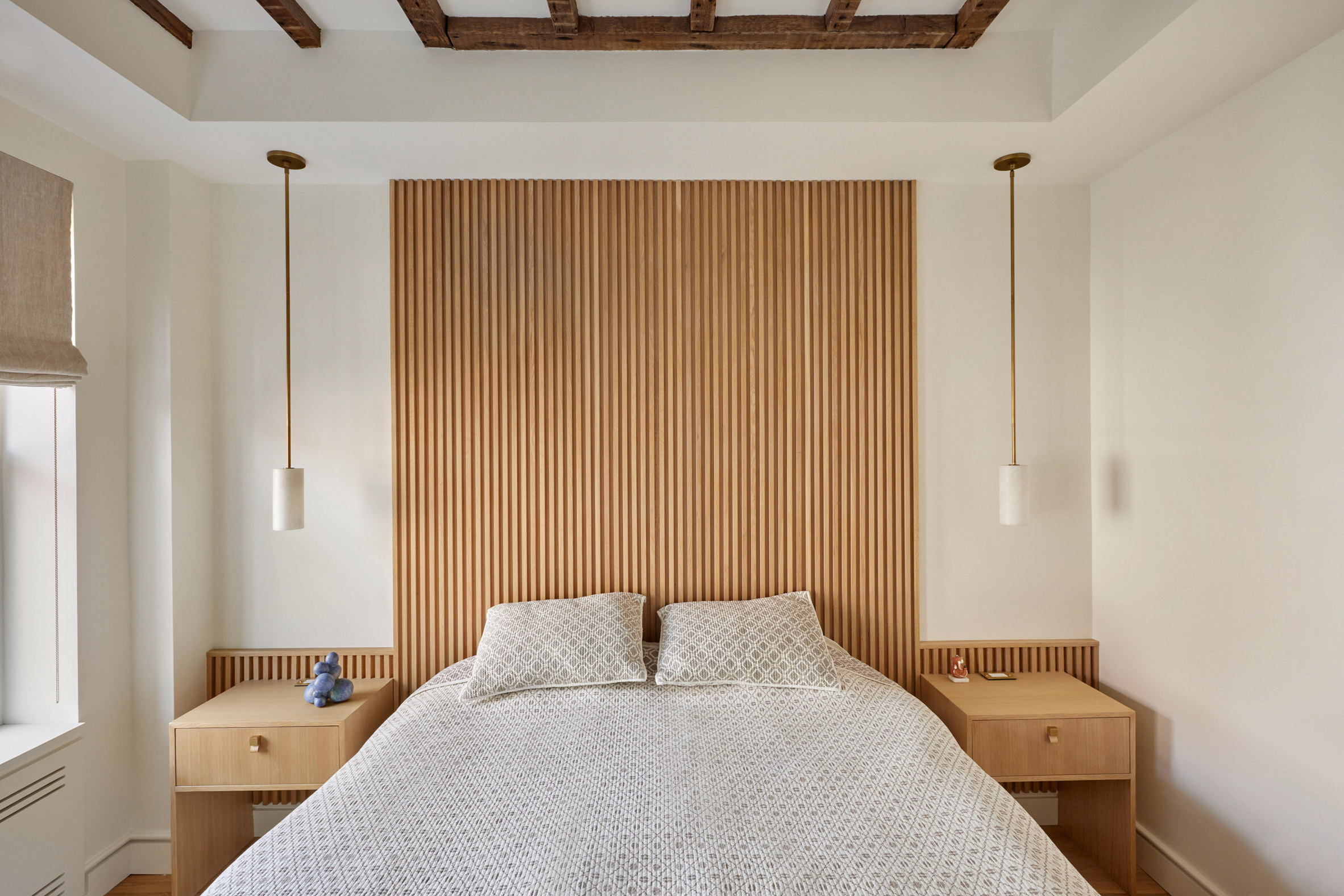 Bedroom with oak headboard