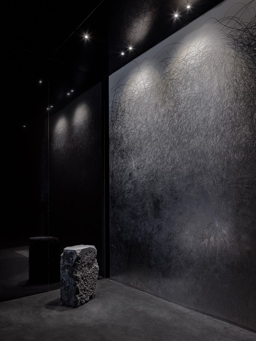 Graphite block and wall in Seoul store interior by WGNB